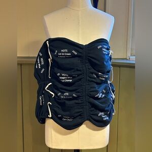 SZ: XL Who will ever forget 2020?This one-of-a-kind, Black Graphic Strapless Top